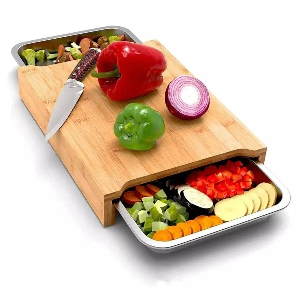 Beech wood cutting board with knife and vegetables on a white background