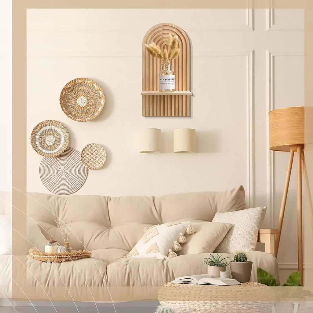 Beige sofa in a living room with decorative Boho Wooden Floating Wall Shelf and a lamp.