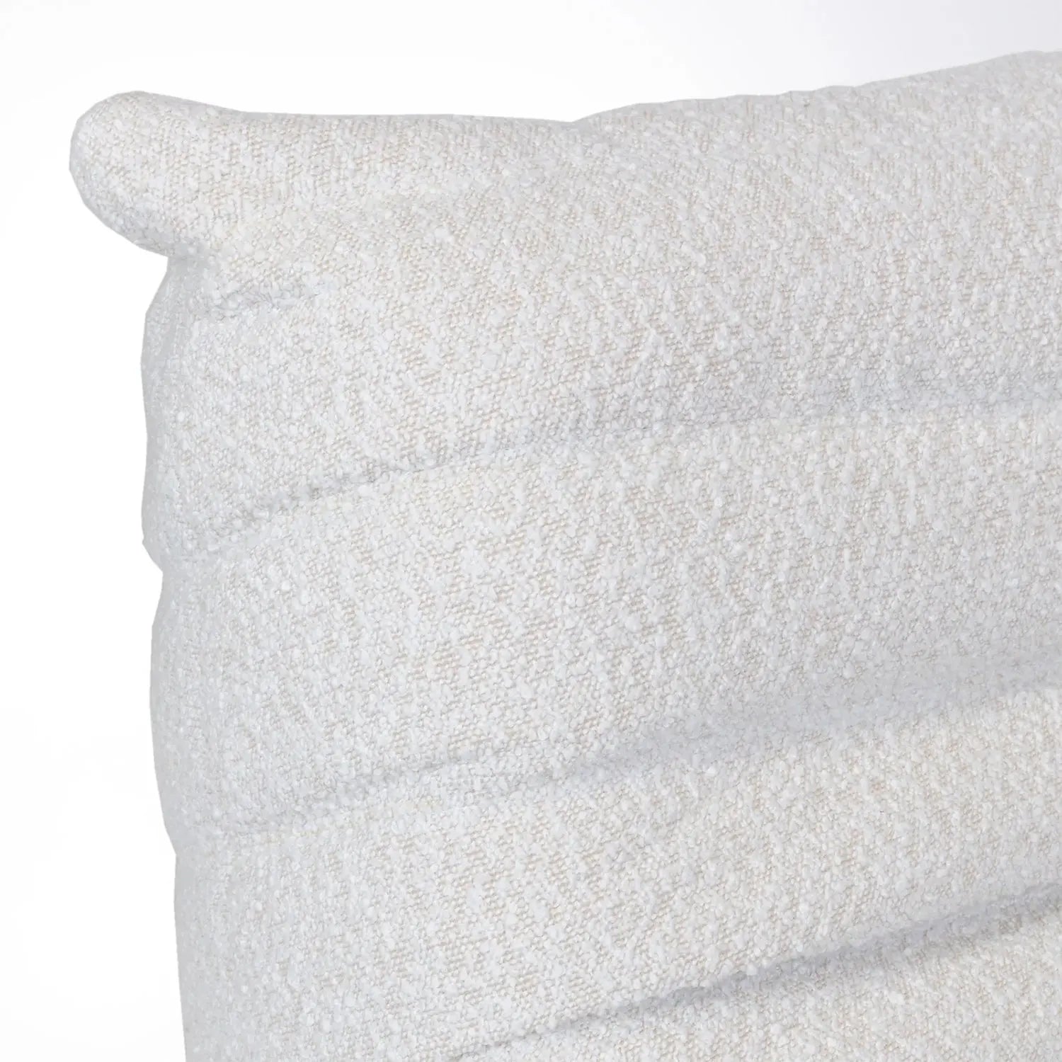 Close-up of a textured Rice Amb Velvet beige fabric on a white background
