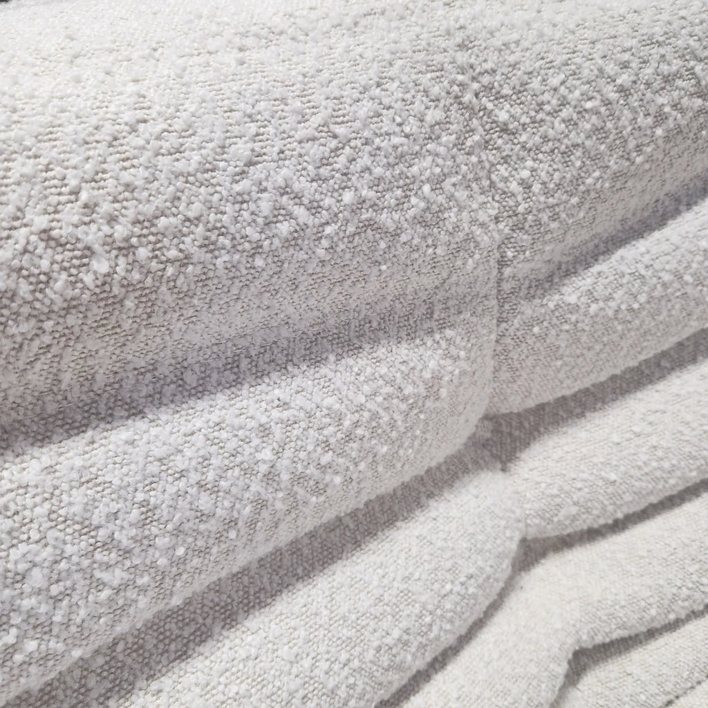 Close-up of textured Rice Amb Velvet fabric with a soft, plush finish.
