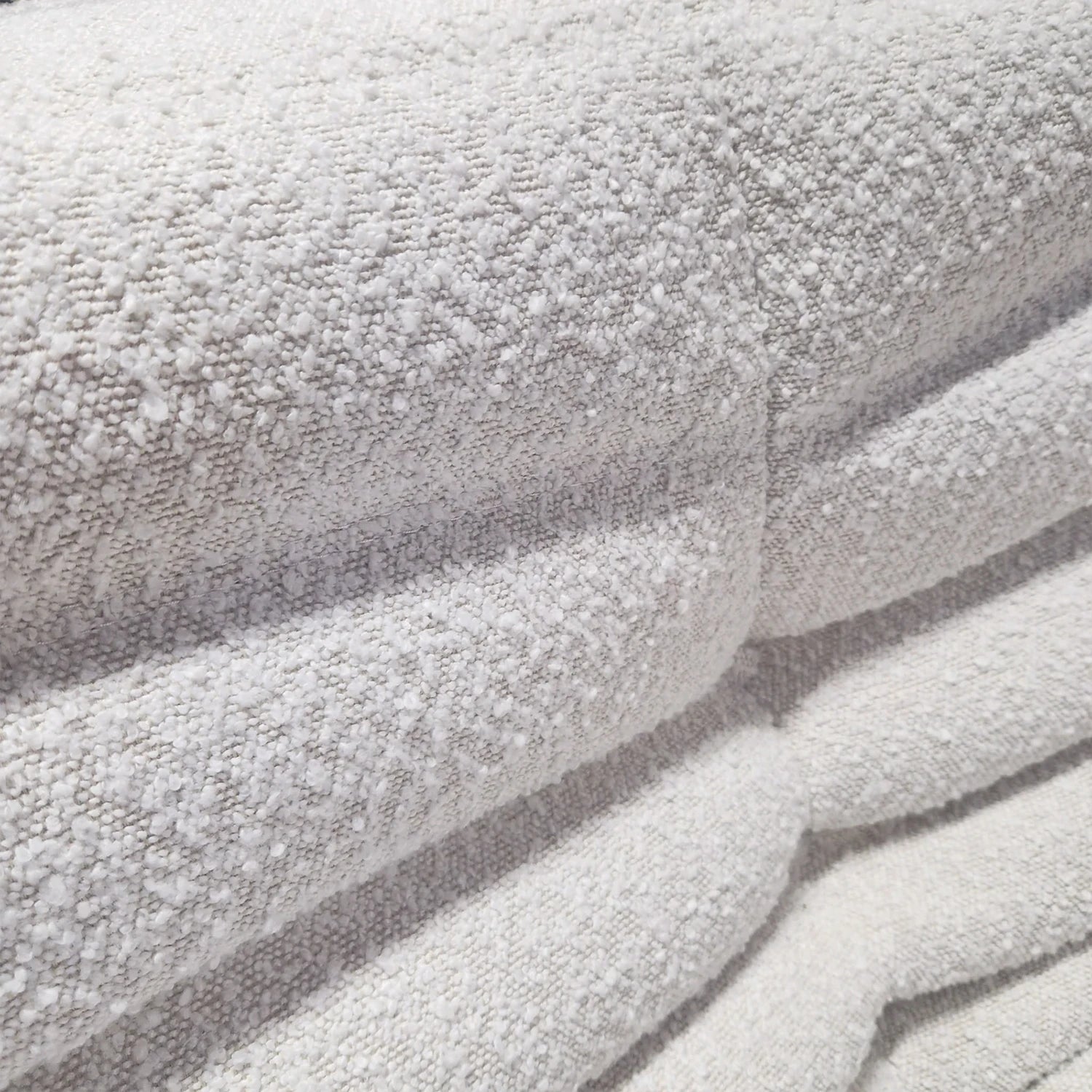 Close-up of textured Rice Amb Velvet fabric with a soft, plush finish.