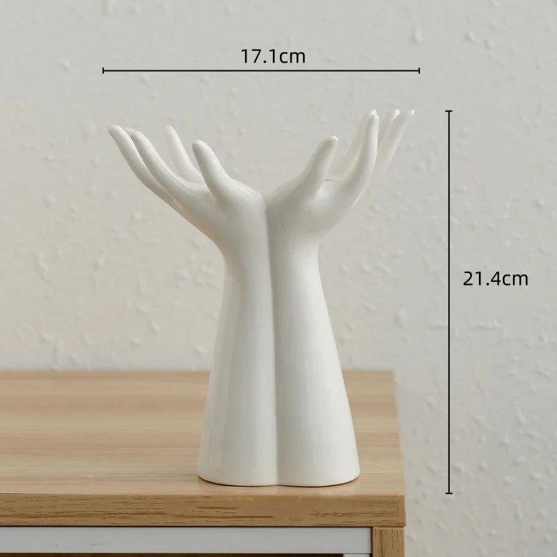 Large white Ceramic Hand Vase on a wooden surface and light gray background with dimensions.