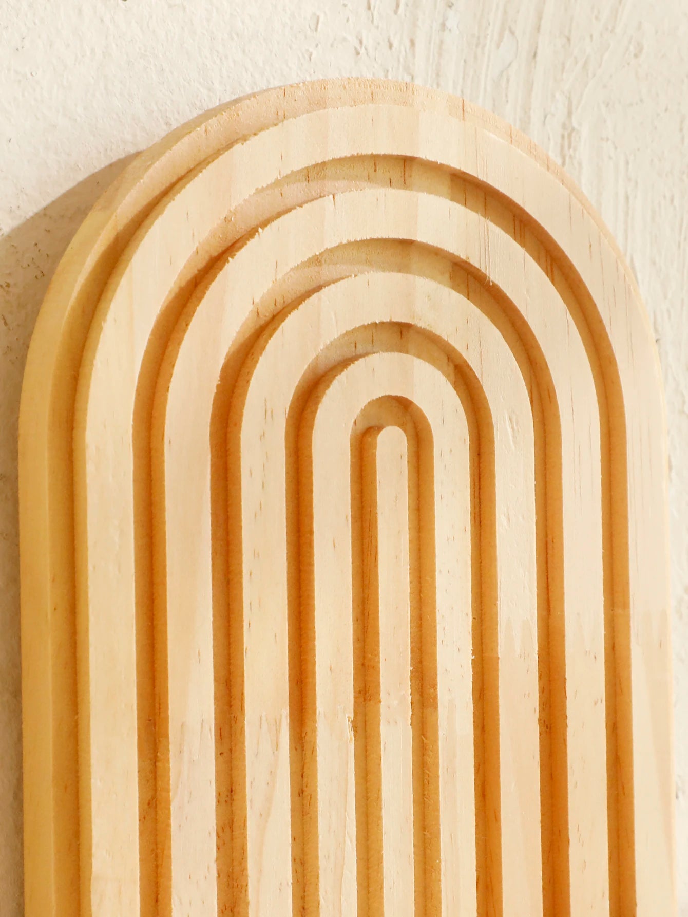 Wooden arches with a textured beige background